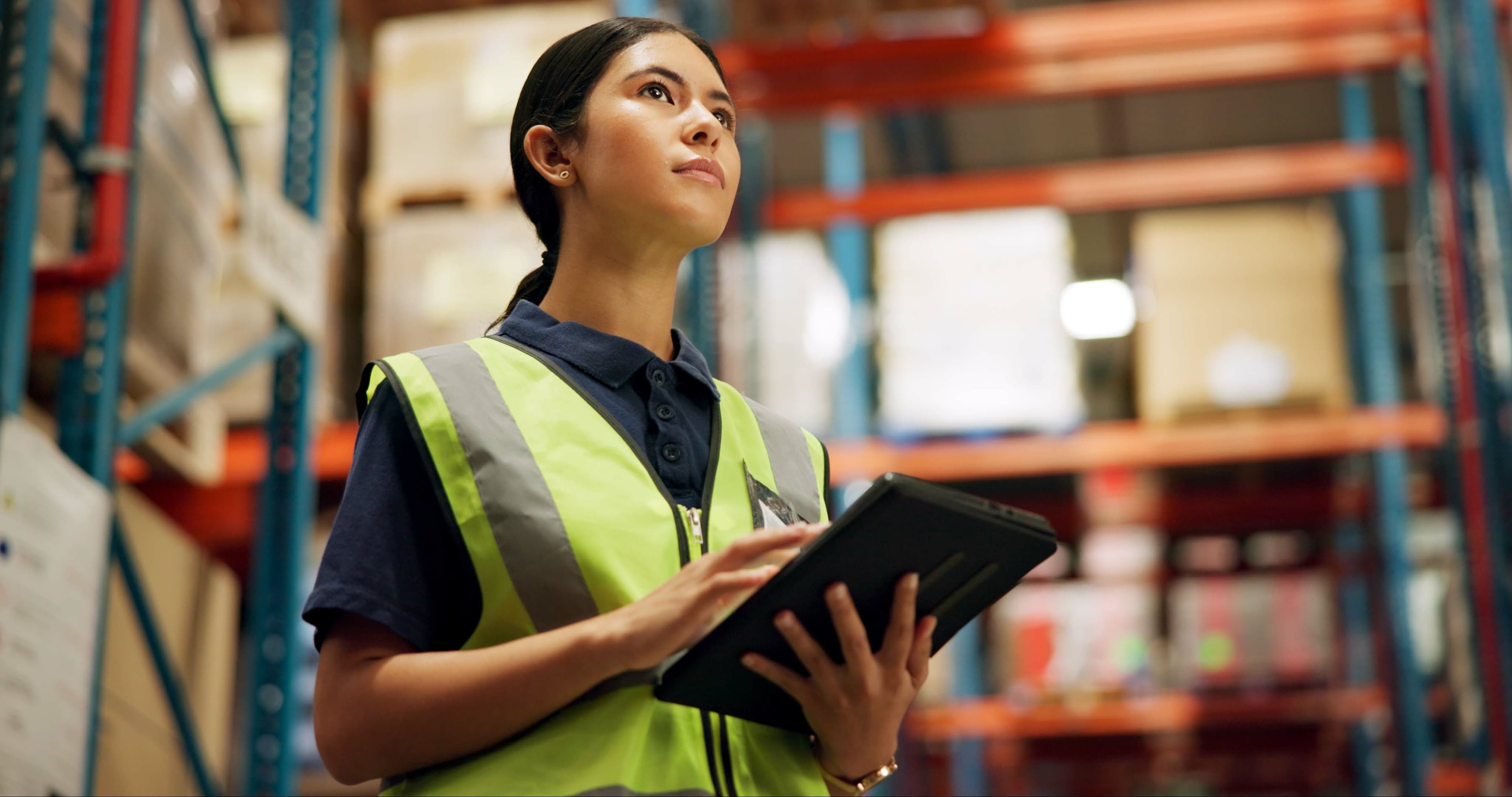 Image of a person with clipboard managing ISO9001 Quality